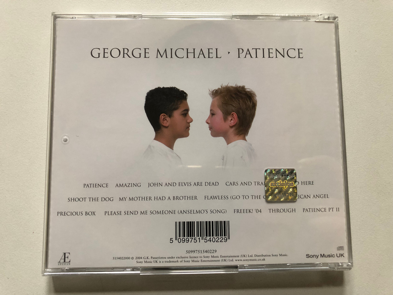 https://cdn11.bigcommerce.com/s-62bdpkt7pb/products/0/images/315117/George_Michael_Patience_Aegean_Audio_CD_2004_515402_2_2__00160.1701888314.1280.1280.JPG?c=2