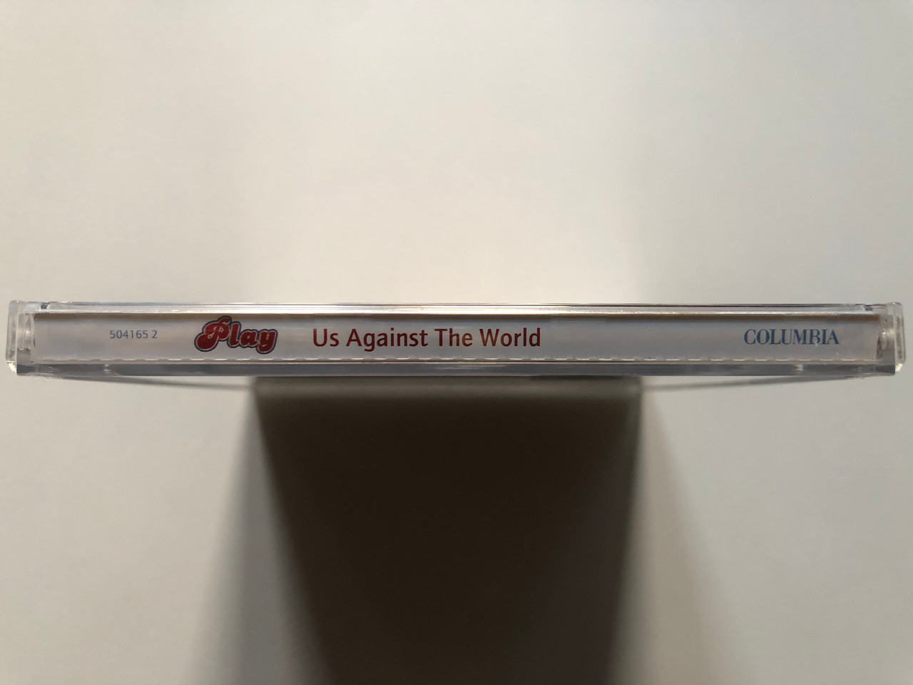 https://cdn11.bigcommerce.com/s-62bdpkt7pb/products/0/images/315163/Play_Us_Against_The_World_Columbia_Audio_CD_2002_504165_2_3__70568.1701963041.1280.1280.JPG?c=2