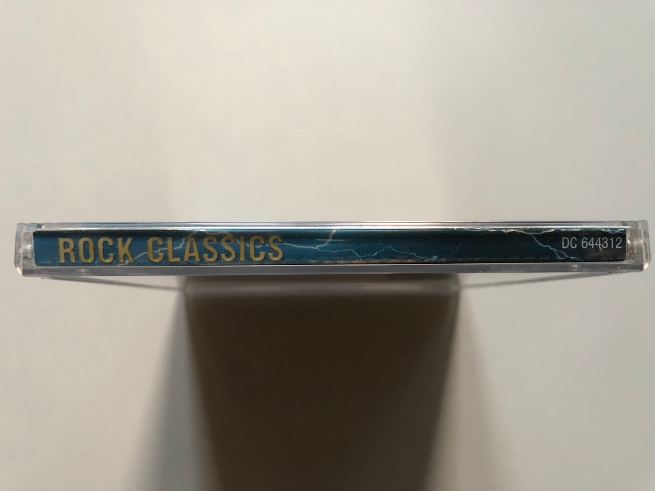 https://cdn11.bigcommerce.com/s-62bdpkt7pb/products/0/images/315443/Rock_Classics_-_Golden_Earring_The_Doobie_Brothers_Deep_Purple_Poison_Snowy_White_Gary_Moore_Whitesnake_Disky_Audio_CD_2001_DC_644312_3__90323.1701972460.1280.1280.JPG?c=2