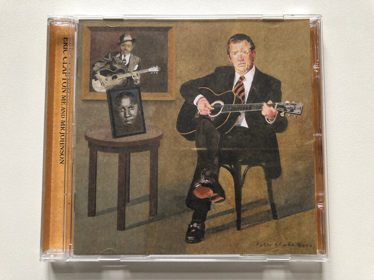 https://cdn11.bigcommerce.com/s-62bdpkt7pb/products/0/images/315694/Eric_Clapton_Me_And_Mr_Johnson_Reprise_Records_Audio_CD_2017_9362-48730-2_1__86982.1702040505.1280.1280.JPG?c=2