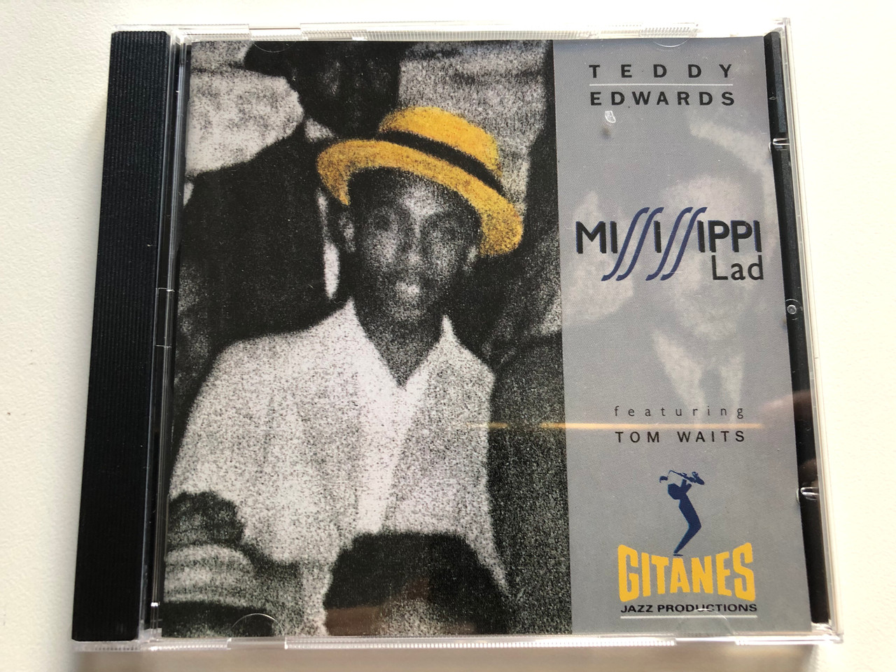 https://cdn11.bigcommerce.com/s-62bdpkt7pb/products/0/images/315991/Teddy_Edwards_featuring_Tom_Waits_Mississippi_Lad_Gitanes_Jazz_Audio_CD_1991_511_111-2_1__09231.1702366946.1280.1280.JPG?c=2