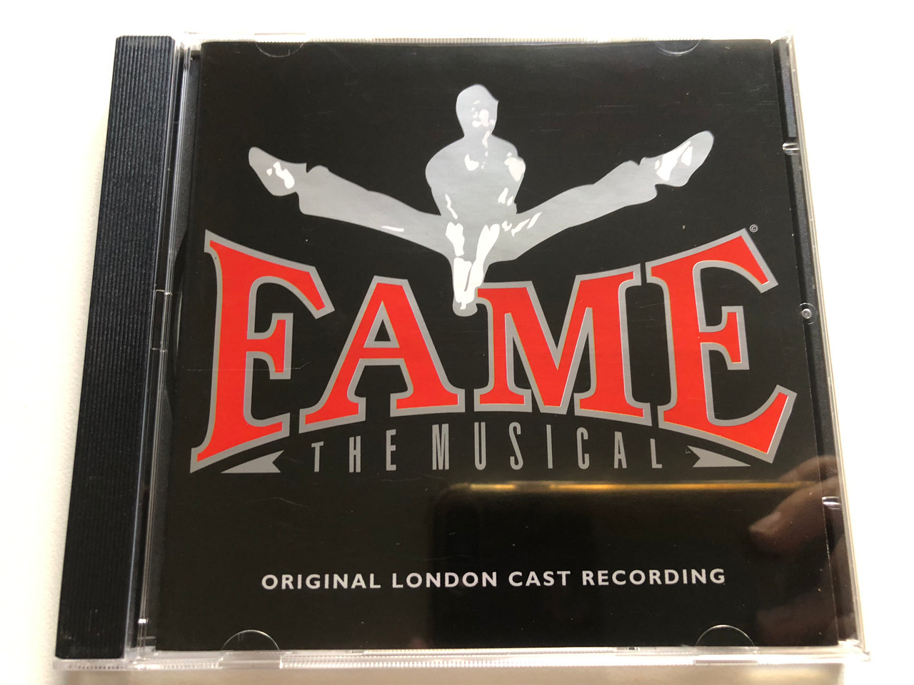 https://cdn11.bigcommerce.com/s-62bdpkt7pb/products/0/images/316134/Original_London_Cast_Fame_The_Musical_Really_Useful_Records_Audio_CD_1995_529109-2_1__93049.1702465415.1280.1280.JPG?c=2
