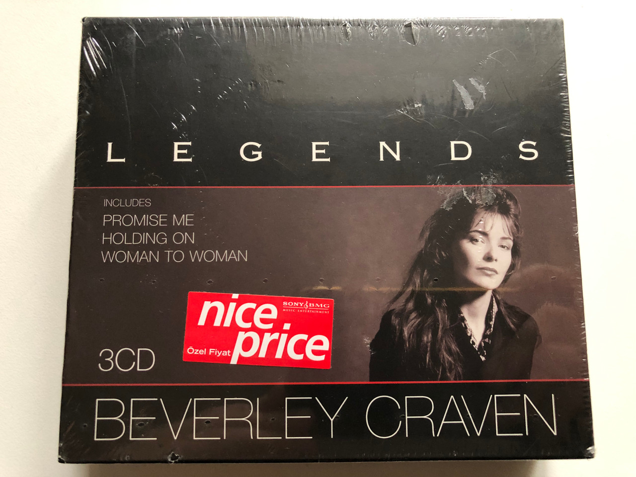 https://cdn11.bigcommerce.com/s-62bdpkt7pb/products/0/images/316792/Beverley_Craven_Legends_-_Includes_Promise_Me_Holding_On_Woman_To_Woman_Sony_BMG_Music_Entertainment_3x_Audio_CD_Box_Set_2005_5204362_1__88459.1702919601.1280.1280.JPG?c=2