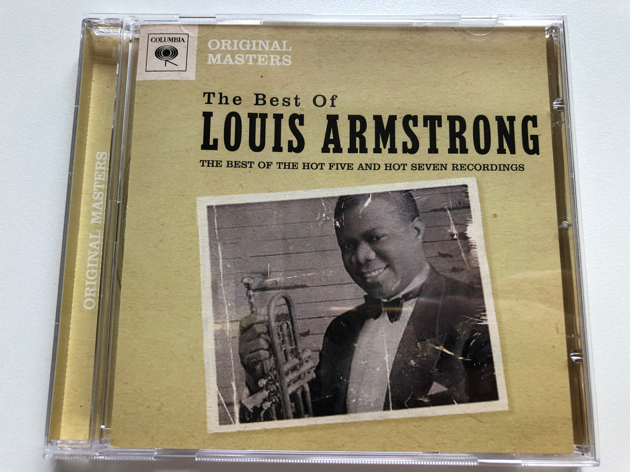 https://cdn11.bigcommerce.com/s-62bdpkt7pb/products/0/images/316894/The_Best_Of_Louis_Armstrong_-_The_Best_Of_The_Hot_Five_And_Hot_Seven_Recordings_Original_Masters_Columbia_Audio_CD_2008_88697213952_1__25472.1702966481.1280.1280.JPG?c=2
