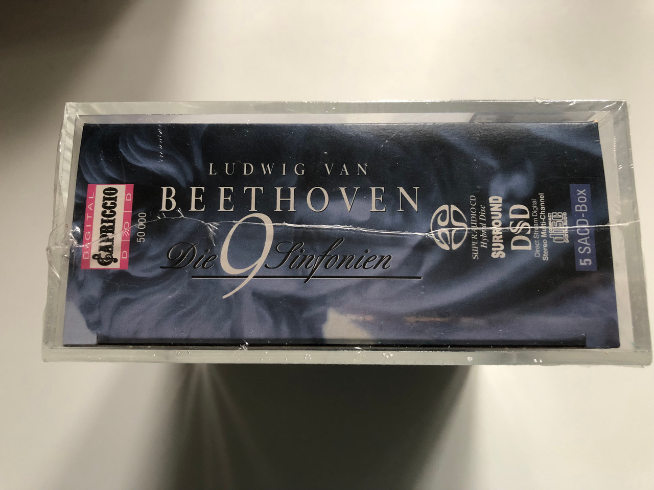 https://cdn11.bigcommerce.com/s-62bdpkt7pb/products/0/images/316931/Ludwig_van_Beethoven_Die_9_Sinfonien_-_Dresdner_Philharmonie_Herbert_Kegel_Capriccio_5x_Hybrid_Disc_Box_Set_2003_50_000_3__74165.1702972548.1280.1280.JPG?c=2