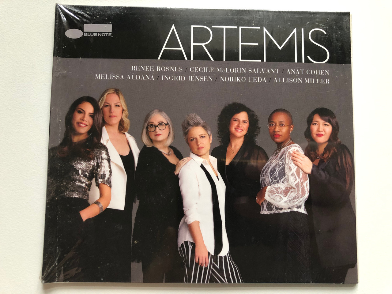 https://cdn11.bigcommerce.com/s-62bdpkt7pb/products/0/images/316953/Artemis_-_Renee_Rosnes_Ccile_McLorin_Salvant_Anat_Cohen_Melissa_Aldana_Ingrid_Jensen_Noriko_Ueda_Allison_Miller_Blue_Note_Audio_CD_2020_00602508937385_1__17399.1702982379.1280.1280.JPG?c=2