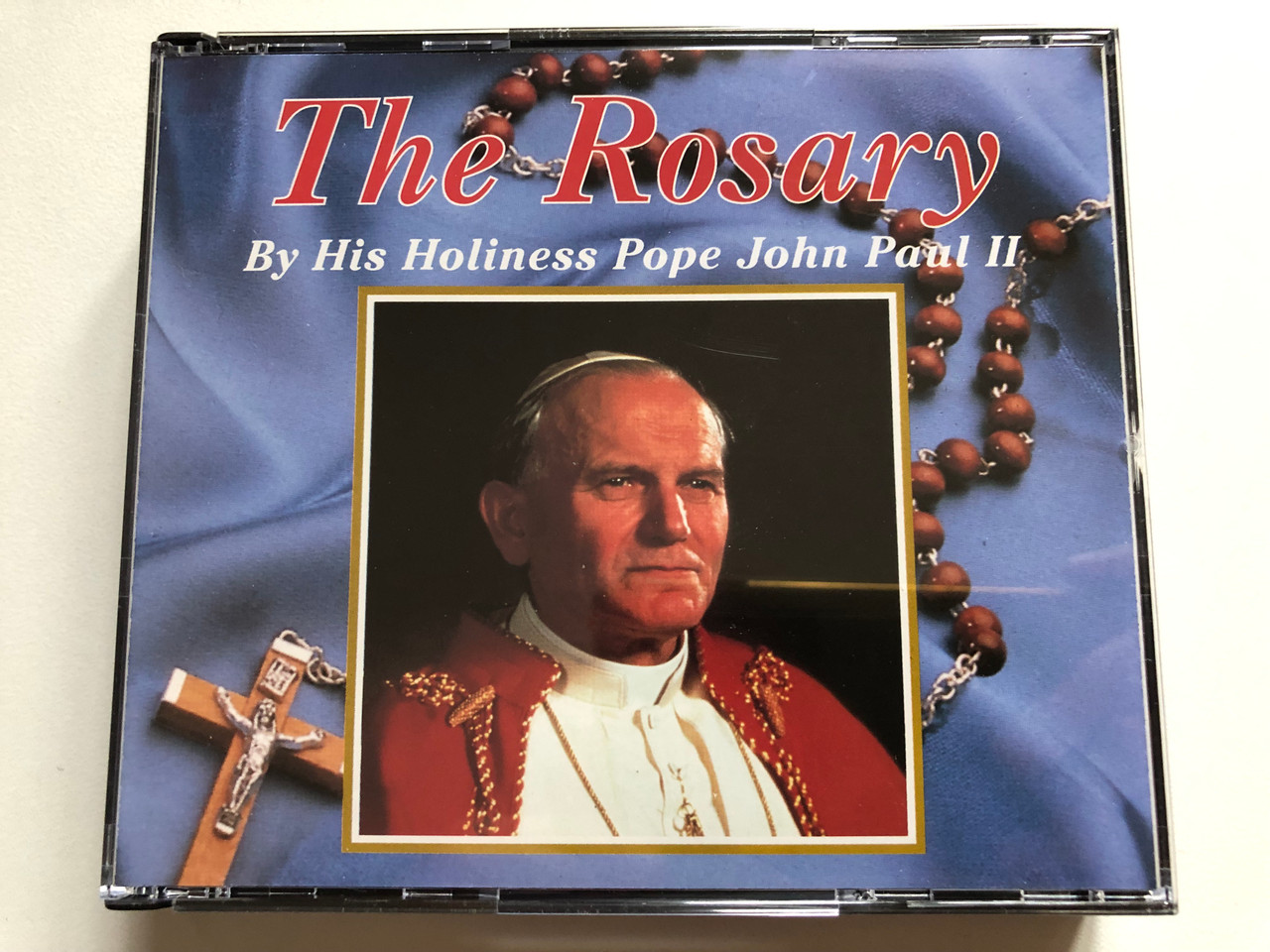 https://cdn11.bigcommerce.com/s-62bdpkt7pb/products/0/images/318938/The_Rosary_-_By_His_Holiness_Pope_John_Paul_II_Pure_Music_2x_Audio_CD_1994_PMCD7009_1__94799.1703768538.1280.1280.JPG?c=2