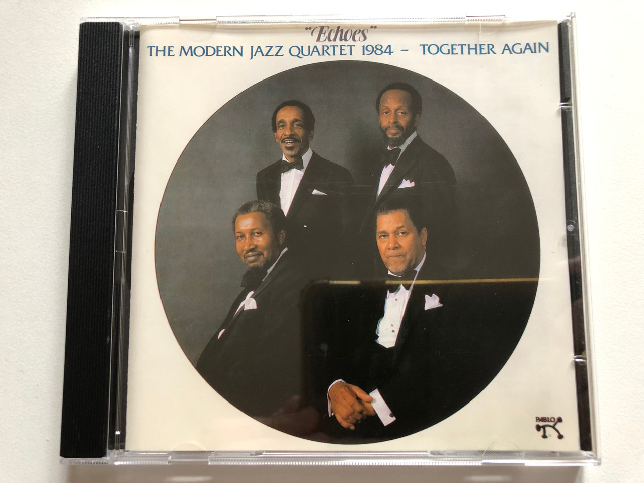 https://cdn11.bigcommerce.com/s-62bdpkt7pb/products/0/images/318989/The_Modern_Jazz_Quartet_1984_-_Together_Again_-_Echoes_Pablo_Records_Audio_CD_CD_2312_1__95764.1703784138.1280.1280.JPG?c=2