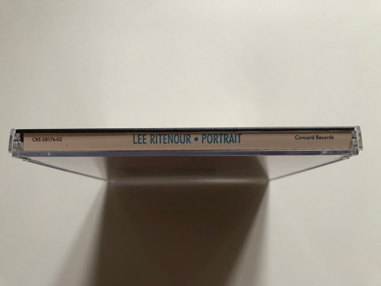 https://cdn11.bigcommerce.com/s-62bdpkt7pb/products/0/images/319010/Lee_Ritenour_Portrait_Concord_Records_Audio_CD_2015_CRE-38176-02_3__87093.1703789579.1280.1280.JPG?c=2
