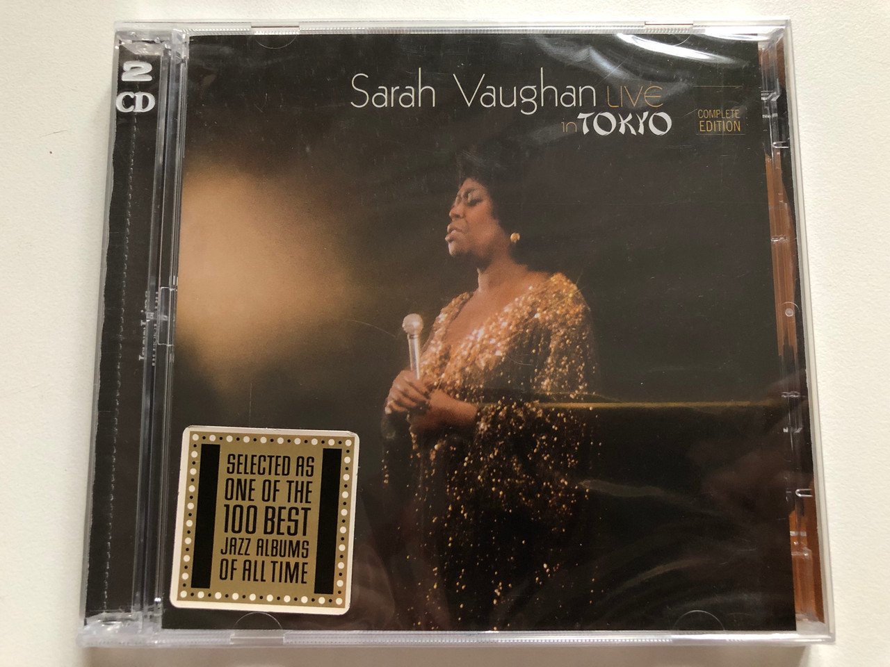 https://cdn11.bigcommerce.com/s-62bdpkt7pb/products/0/images/319109/Sarah_Vaughan_Live_In_Tokyo_Complete_Edition_Selected_As_One_Of_The_100_Best_Jazz_Album_Of_All_Time_Jazz_Lips_2x_Audio_CD_2008_JL758_1__92692.1703831243.1280.1280.JPG?c=2