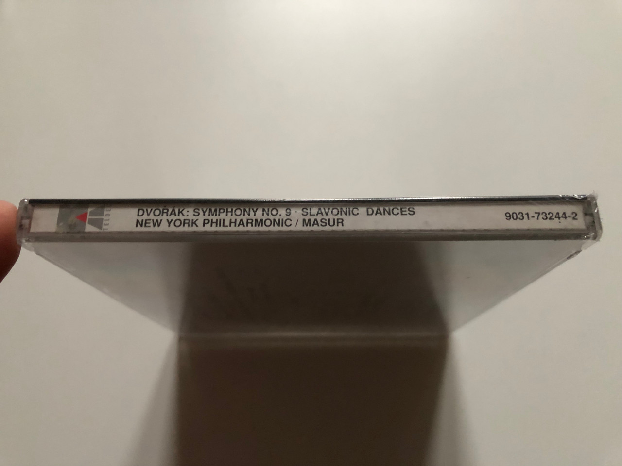 https://cdn11.bigcommerce.com/s-62bdpkt7pb/products/0/images/319438/Dvok_Symphony_No._9_From_The_New_World_-_Slavonic_Dances_New_York_Philharmonic_Kurt_Masur_Teldec_Audio_CD_1992_9031-73244-2_3__18518.1704106509.1280.1280.JPG?c=2