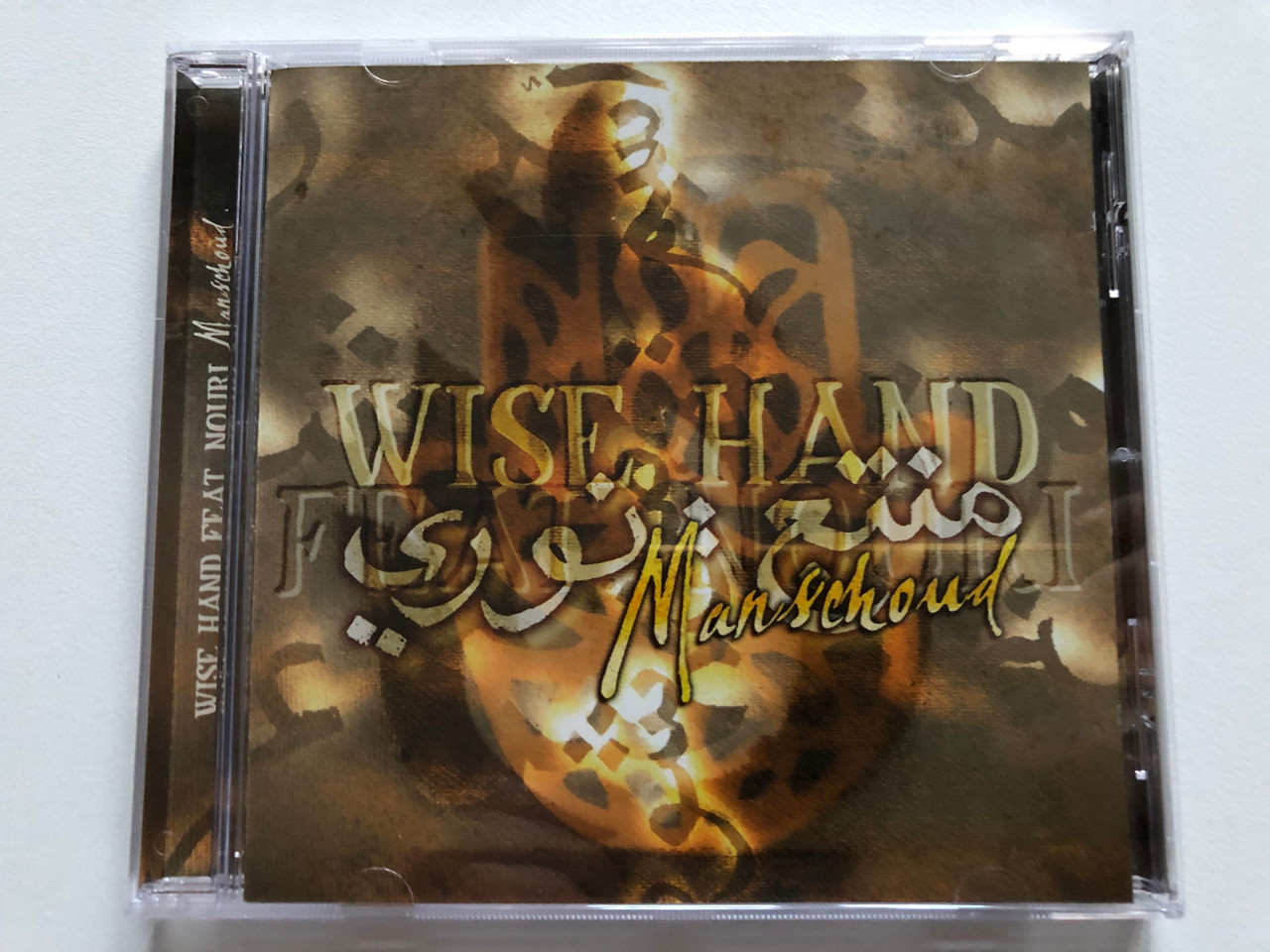 https://cdn11.bigcommerce.com/s-62bdpkt7pb/products/0/images/319748/Wise_Hand_feat_Nouri_Manschoud_WEA_Audio_CD_1998_398422425-2_1__29381.1704236281.1280.1280.JPG?c=2