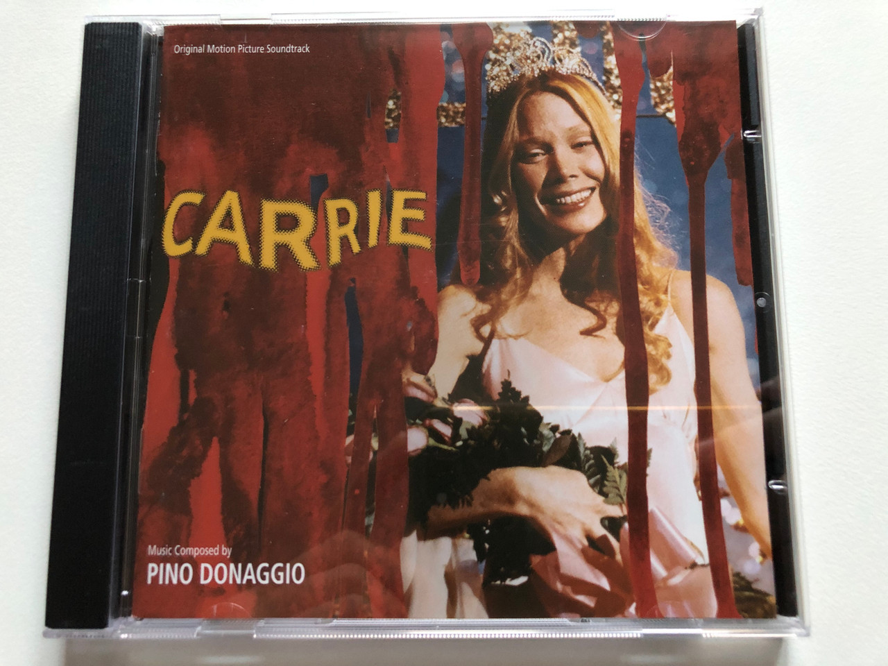 https://cdn11.bigcommerce.com/s-62bdpkt7pb/products/0/images/319774/Carrie_Original_Motion_Picture_Soundtrack_-_Music_Composed_By_Pino_Donaggio_Varse_Sarabande_Audio_CD_2005_YSD-4418_1__48036.1704275105.1280.1280.JPG?c=2