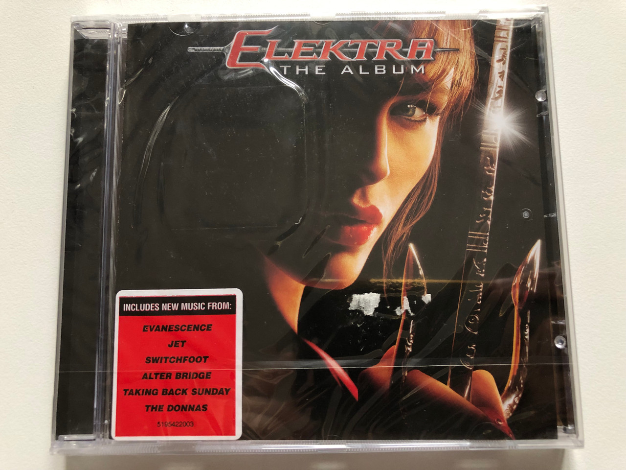 https://cdn11.bigcommerce.com/s-62bdpkt7pb/products/0/images/319805/Elektra_-_The_Album_Includes_New_Music_From_Evanescence_Jet_Switchfoot_Alter_Bridge_Taking_Back_Sunday_The_Donnas_Wind-up_Audio_CD_2005_519542_2_1__87443.1704285206.1280.1280.JPG?c=2