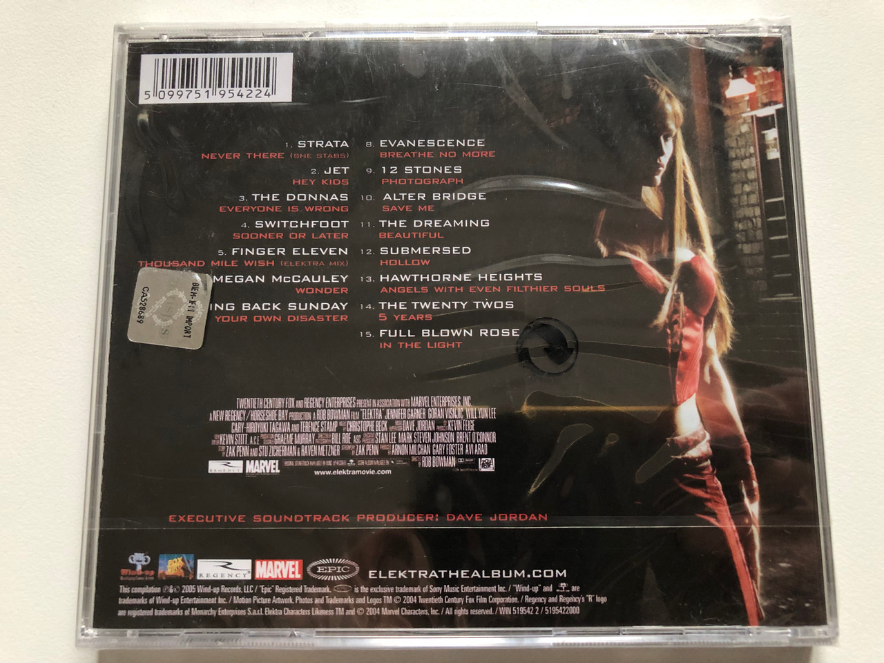 https://cdn11.bigcommerce.com/s-62bdpkt7pb/products/0/images/319806/Elektra_-_The_Album_Includes_New_Music_From_Evanescence_Jet_Switchfoot_Alter_Bridge_Taking_Back_Sunday_The_Donnas_Wind-up_Audio_CD_2005_519542_2_2__64399.1704285218.1280.1280.JPG?c=2