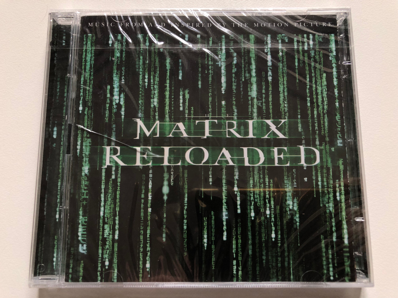 https://cdn11.bigcommerce.com/s-62bdpkt7pb/products/0/images/319835/Matrix_Reloaded_Music_From_And_Inspired_By_The_Motion_Picture_Warner_Sunset_Records_2x_Audio_CD_2003_9362-48411-2_1__27640.1704353050.1280.1280.JPG?c=2