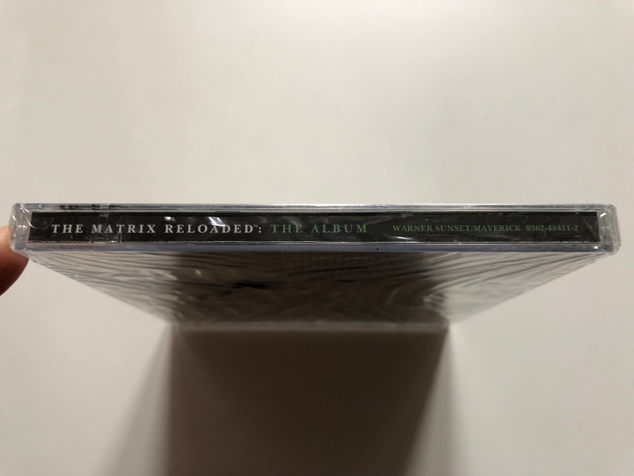 https://cdn11.bigcommerce.com/s-62bdpkt7pb/products/0/images/319837/Matrix_Reloaded_Music_From_And_Inspired_By_The_Motion_Picture_Warner_Sunset_Records_2x_Audio_CD_2003_9362-48411-2_3__47056.1704353067.1280.1280.JPG?c=2