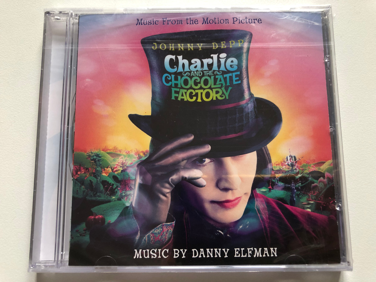 https://cdn11.bigcommerce.com/s-62bdpkt7pb/products/0/images/319851/Charlie_And_The_Chocolate_Factory_Music_From_The_Motion_Picture_-_Music_By_Danny_Elfman_Johnny_Depp_Warner_Sunset_Records_Audio_CD_2005_72264_1__27557.1704355738.1280.1280.JPG?c=2