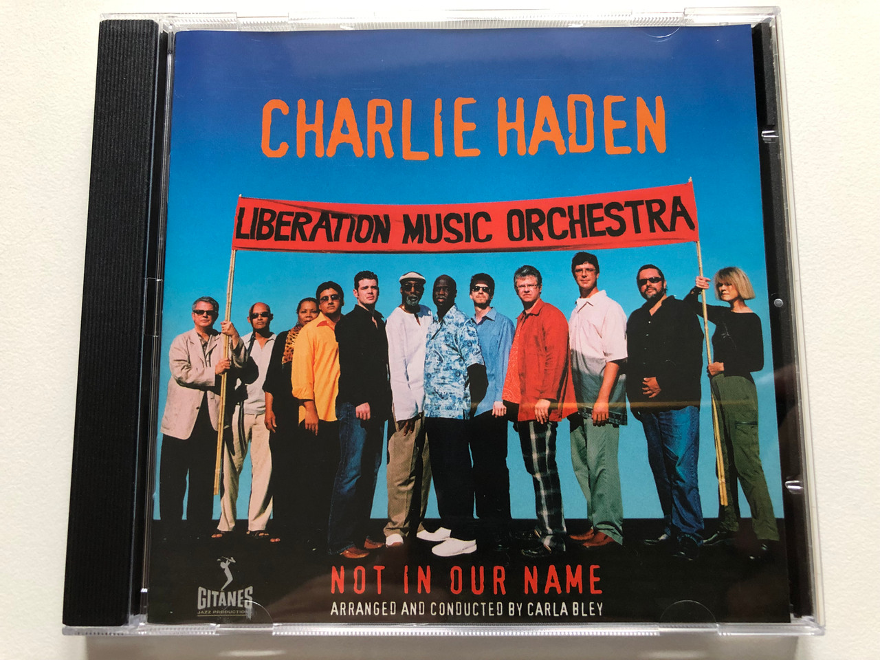 https://cdn11.bigcommerce.com/s-62bdpkt7pb/products/0/images/319871/Charlie_Haden_Liberation_Music_Orchestra_Not_In_Our_Name_-_Arranged_And_Conducted_By_Carla_Bley_Verve_Records_Audio_CD_2005_0602498292488_1__73186.1704361355.1280.1280.JPG?c=2