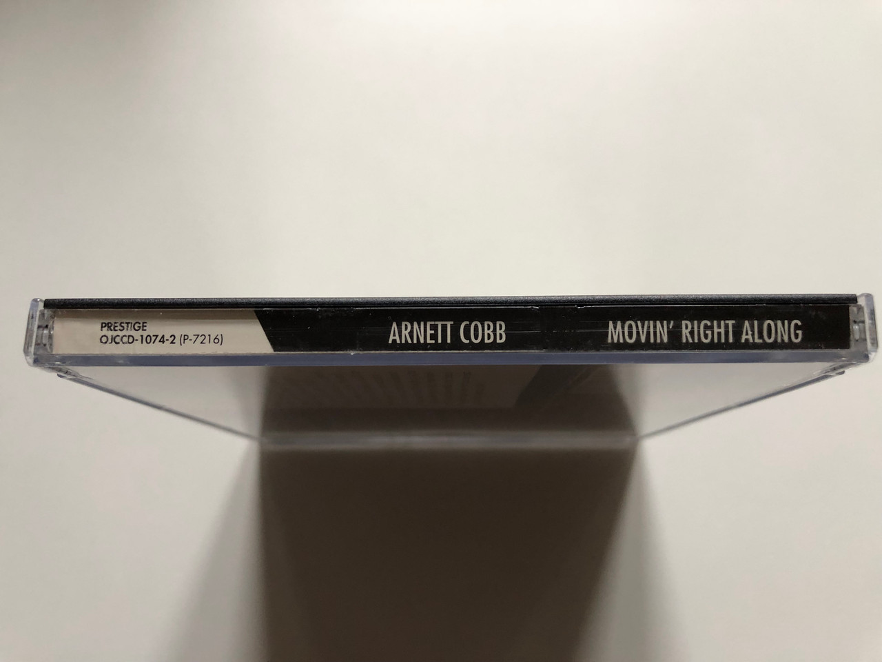 https://cdn11.bigcommerce.com/s-62bdpkt7pb/products/0/images/319902/Arnett_Cobb_Movin_Right_Along_Original_Jazz_Classics_Audio_CD_2002_Stereo_OJCCD-1074-2_3__15920.1704365031.1280.1280.JPG?c=2