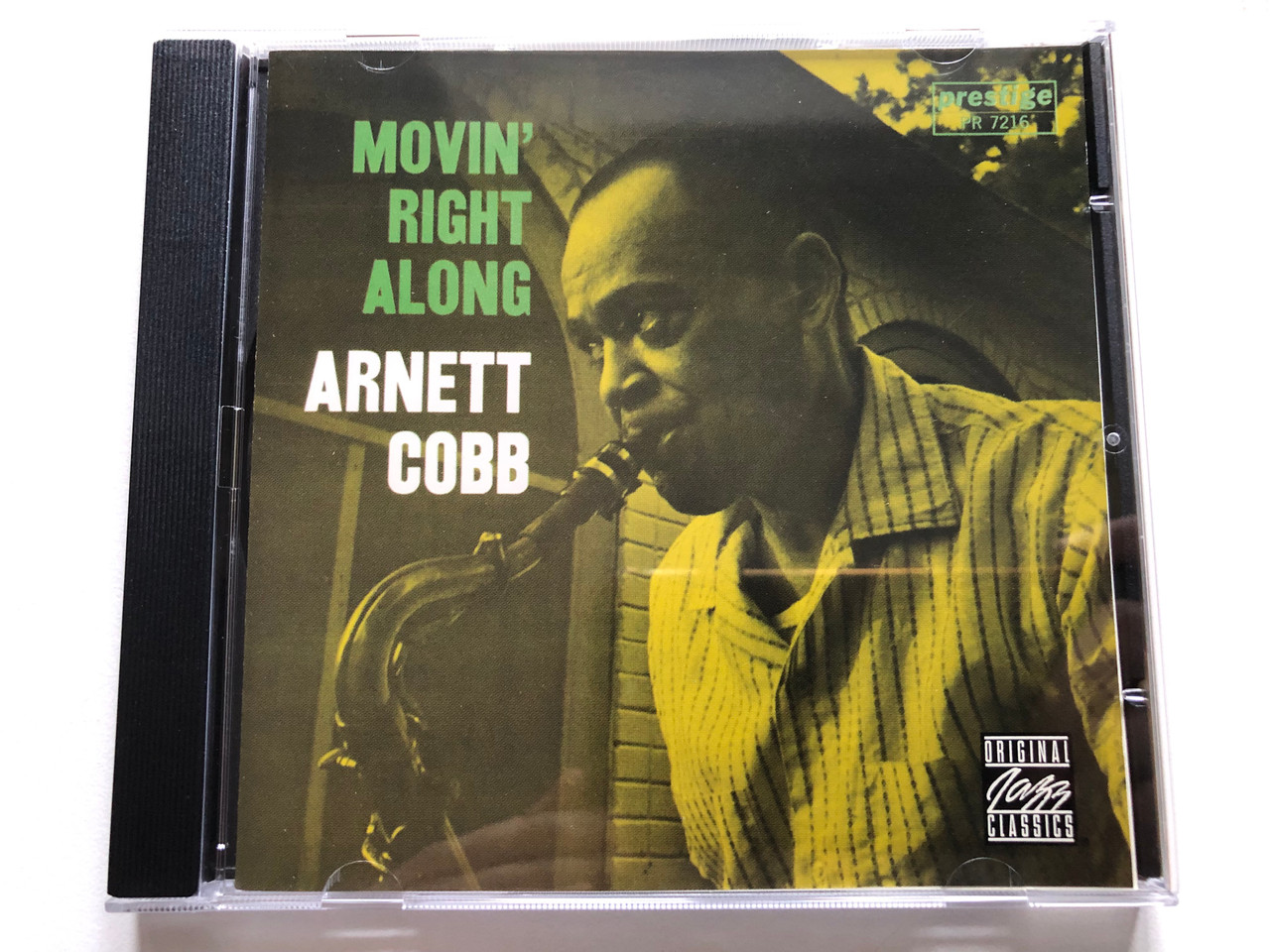 https://cdn11.bigcommerce.com/s-62bdpkt7pb/products/0/images/319904/Arnett_Cobb_Movin_Right_Along_Original_Jazz_Classics_Audio_CD_2002_Stereo_OJCCD-1074-2_1__31794.1704365044.1280.1280.JPG?c=2