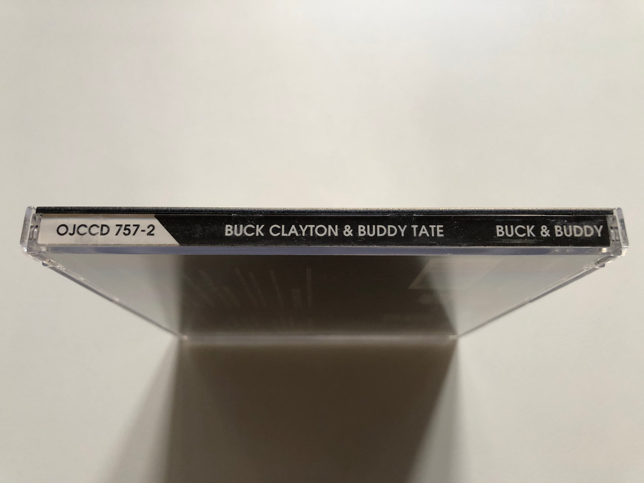 https://cdn11.bigcommerce.com/s-62bdpkt7pb/products/0/images/320232/Buck_Clayton_Buddy_Tate_Buck_Buddy_Original_Jazz_Classics_Audio_CD_Stereo_1992_OJCCD_757-2_3__24778.1704446281.1280.1280.JPG?c=2