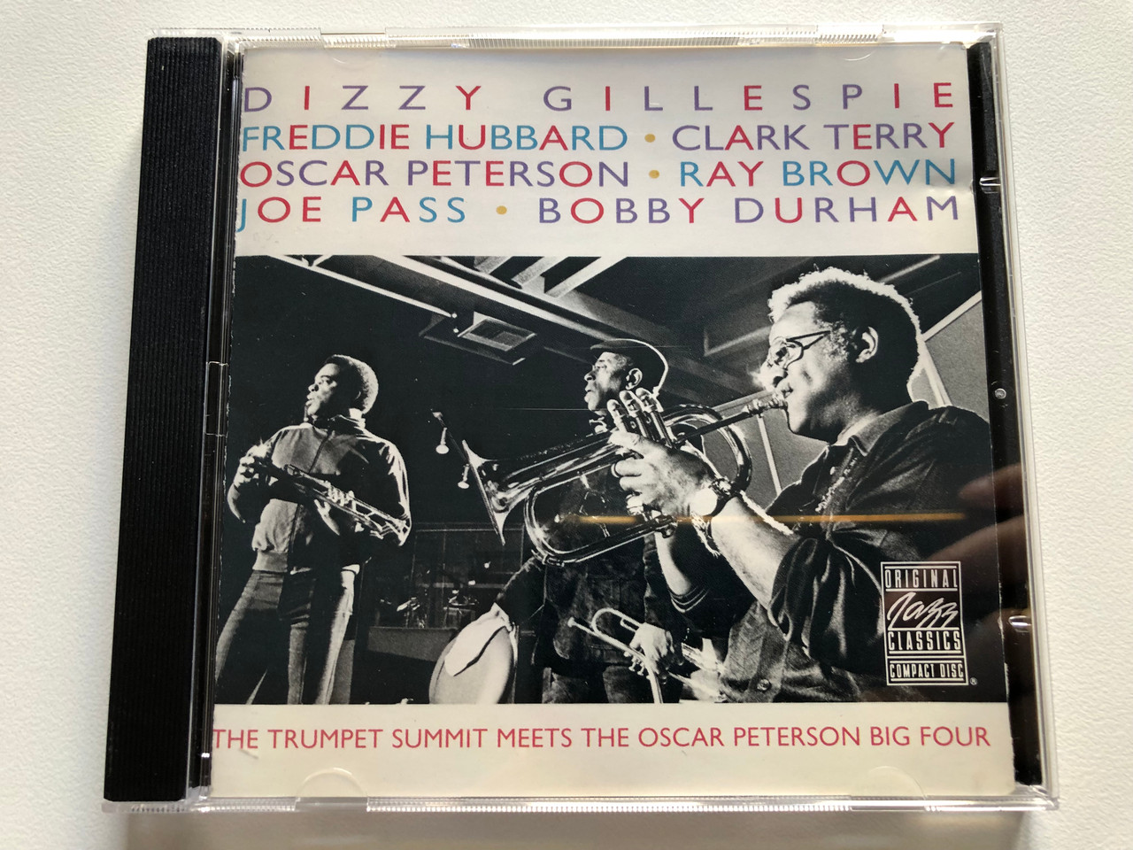 https://cdn11.bigcommerce.com/s-62bdpkt7pb/products/0/images/320641/Dizzy_Gillespie_Freddie_Hubbard_Clark_Terry_Oscar_Peterson_Ray_Brown_Joe_Pass_Bobby_Durhan_-_The_Trumpet_Summit_Meets_The_Oscar_Peterson_Big_Four_Original_Jazz_Classics_Audio_CD_1990_S_1__89916.1704697870.1280.1280.JPG?c=2