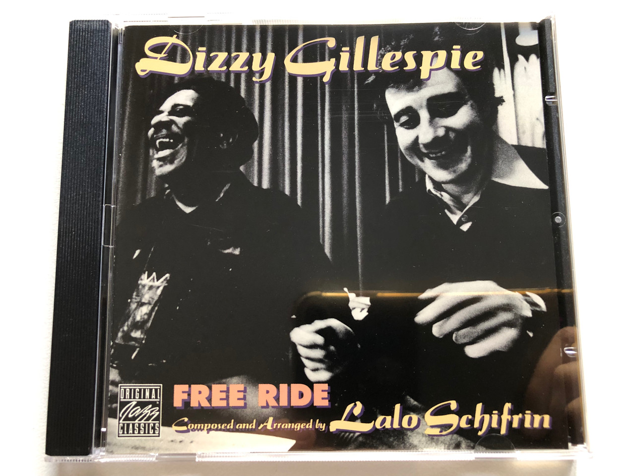 https://cdn11.bigcommerce.com/s-62bdpkt7pb/products/0/images/320686/Dizzy_Gillespie_Free_Ride_-_Composed_and_Arranged_By_Lalo_Schifrin_Original_Jazz_Classics_Audio_CD_1993_Stereo_OJCCD_784-2_1__05236.1704731060.1280.1280.JPG?c=2