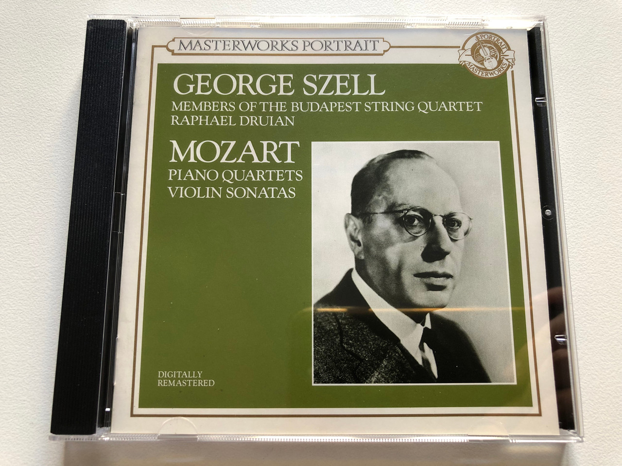 https://cdn11.bigcommerce.com/s-62bdpkt7pb/products/0/images/320898/George_Szell_members_of_The_Budapest_String_Quartet_Raphael_Druian_-_Mozart_Piano_Quartets_Violin_Sonatas_Masterworks_Portrait_CBS_Masterworks_Audio_CD_1991_Mono_Stereo_MPK_47685_1__50894.1704815195.1280.1280.JPG?c=2