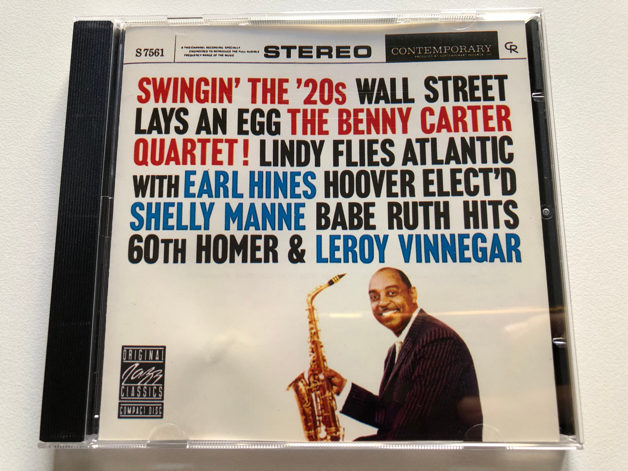 https://cdn11.bigcommerce.com/s-62bdpkt7pb/products/0/images/320912/Swingin_The_20s_-_Wall_Street_Lays_An_Egg_-_The_Benny_Carter_Quartet_Lindy_Flies_Atlantic_With_Earl_Hines_Hoover_ElectD_Shelly_Manne_Babe_Ruth_Hits_60th_Homer_Leroy_Vinnegar_Origina_1__64655.1704818648.1280.1280.JPG?c=2