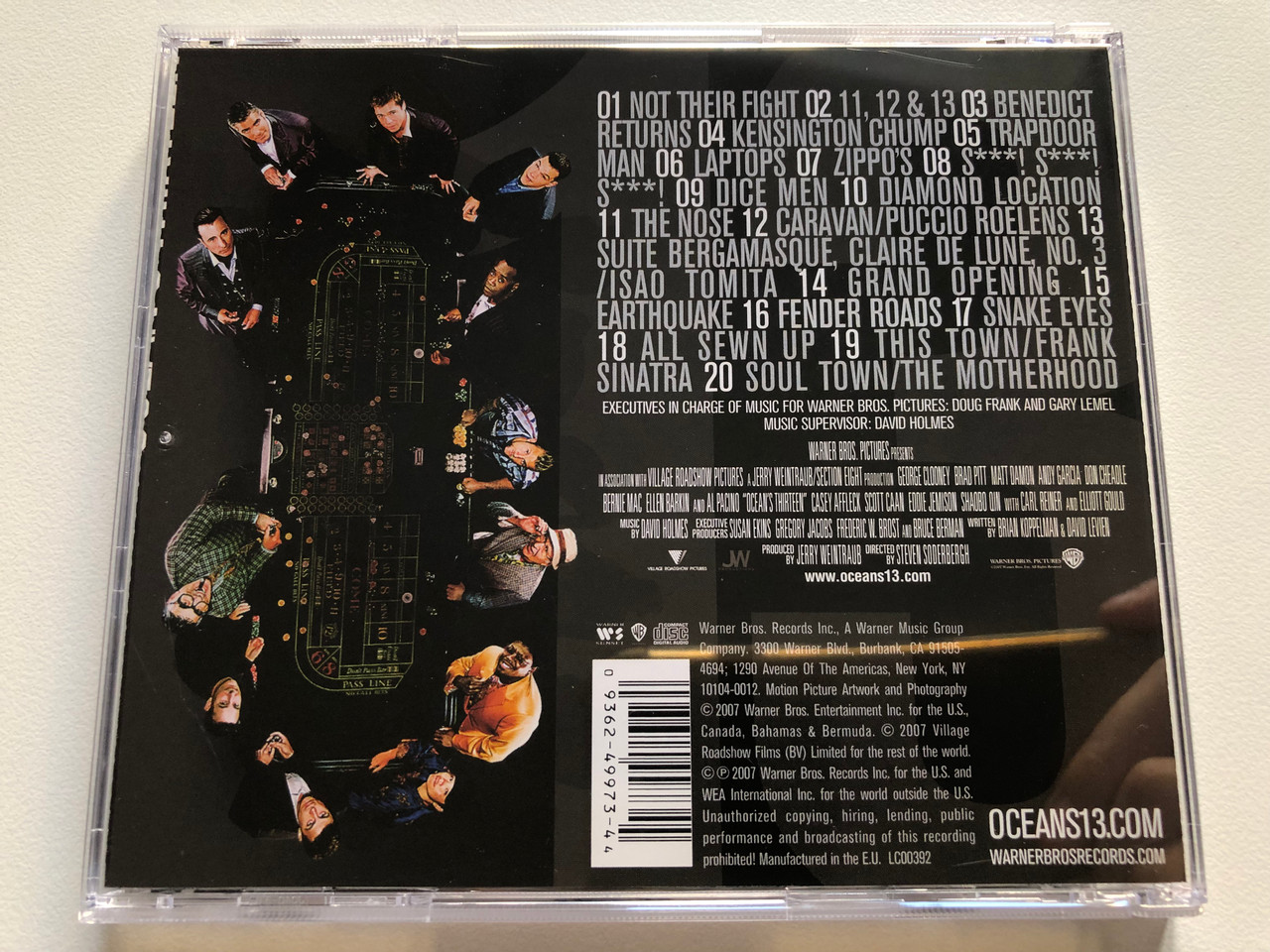 https://cdn11.bigcommerce.com/s-62bdpkt7pb/products/0/images/320995/Music_From_The_Motion_Picture_Oceans_Thirteen_-_Music_By_David_Holmes_Warner_Sunset_Records_Audio_CD_2007_9362-49973-4_2__75117.1704864066.1280.1280.JPG?c=2