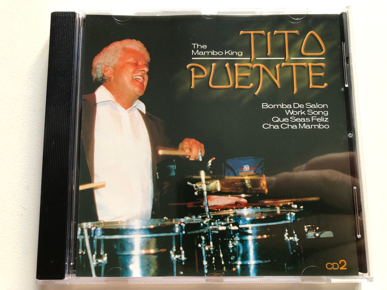 https://cdn11.bigcommerce.com/s-62bdpkt7pb/products/0/images/321319/The_Mambo_King_Tito_Puente_CD_2_-_Bomba_De_Salon_Work_Song_Que_Seas_Feliz_Cha_Cha_Mambo_Eurotrend_Audio_CD_Stereo_CD_152_1__13979.1704965144.1280.1280.JPG?c=2