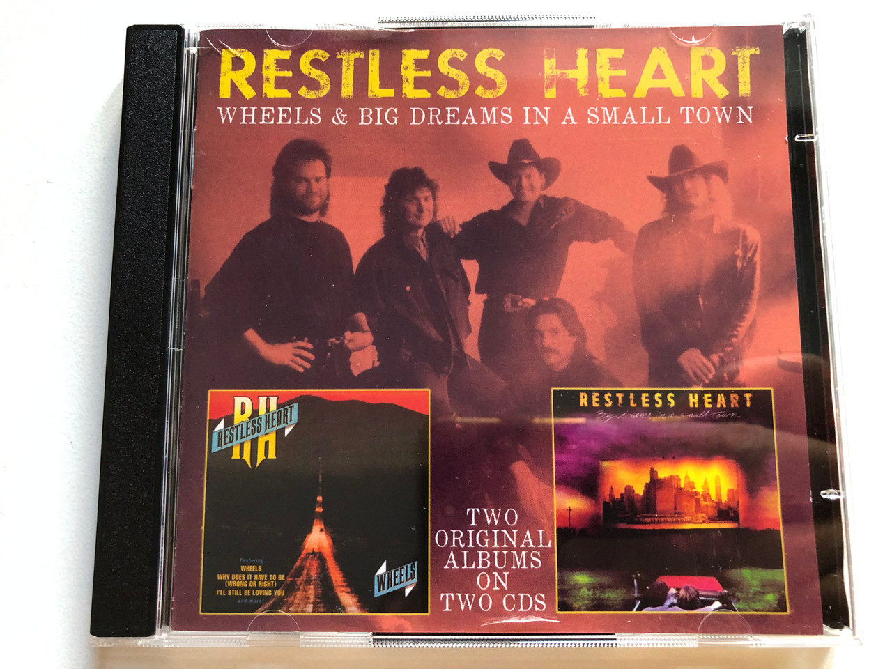 https://cdn11.bigcommerce.com/s-62bdpkt7pb/products/0/images/321405/Restless_Heart_Wheels_Big_Dreams_In_A_Small_Town_Two_Original_Albums_On_Two_CDs_SPV_Country_2x_Audio_CD_2013_SPV_265092_2CD_1__16430.1705074899.1280.1280.JPG?c=2