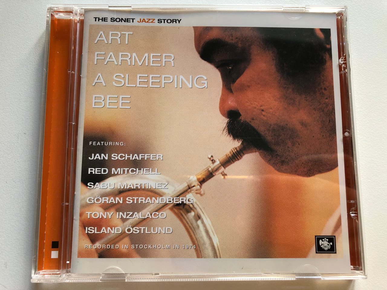 https://cdn11.bigcommerce.com/s-62bdpkt7pb/products/0/images/321539/Art_Farmer_A_Sleeping_Bee_-_Featuring_Jan_Schaffer_Red_Mitchell_Sabu_Martinez_Goran_Strandberg_Tony_Inzalaco_Island_Ostlund_Recorded_In_Stockholm_In_1974_The_Sonet_Jazz_Story_Universal_1__40287.1705082348.1280.1280.JPG?c=2