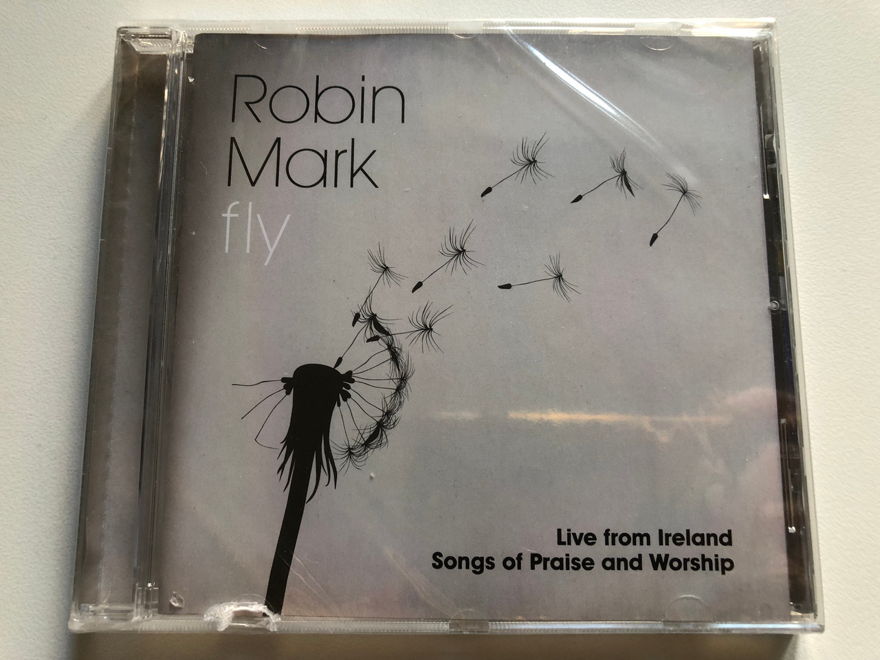 https://cdn11.bigcommerce.com/s-62bdpkt7pb/products/0/images/321651/Robin_Mark_Fly_Live_From_Ireland_Songs_Of_Praise_And_Worship_inciite_Audio_CD_2011_878207007128_1__68850.1705335293.1280.1280.JPG?c=2