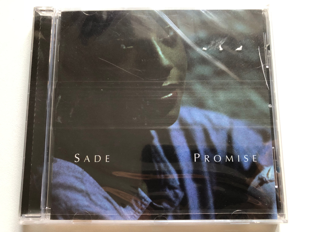 https://cdn11.bigcommerce.com/s-62bdpkt7pb/products/0/images/321668/Sade_Promise_Epic_Audio_CD_500596_2_1__07796.1705388448.1280.1280.JPG?c=2