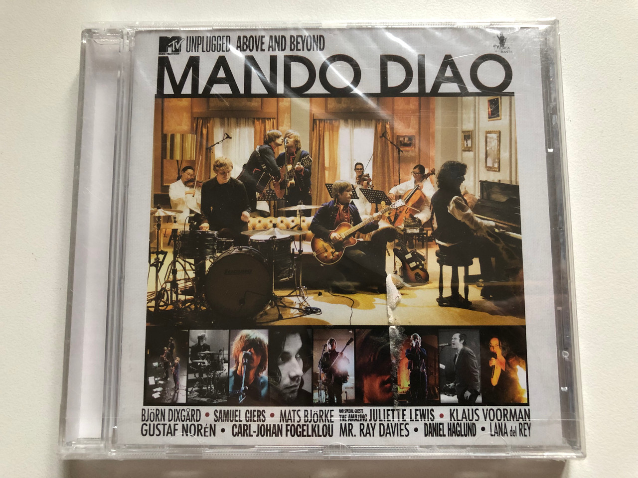https://cdn11.bigcommerce.com/s-62bdpkt7pb/products/0/images/321874/Mando_Diao_MTV_Unplugged_Above_And_Beyond_-_Bjrn_Dixgrd_Samuel_Giers_Mats_Bjrke_Juliette_Lewis_Klaus_Voormann_Gustaf_Norn_Carl-Johan_Fogelklou_Mr._Ray_Davies_Daniel_Haglund_Vert_1__62030.1705556424.1280.1280.JPG?c=2
