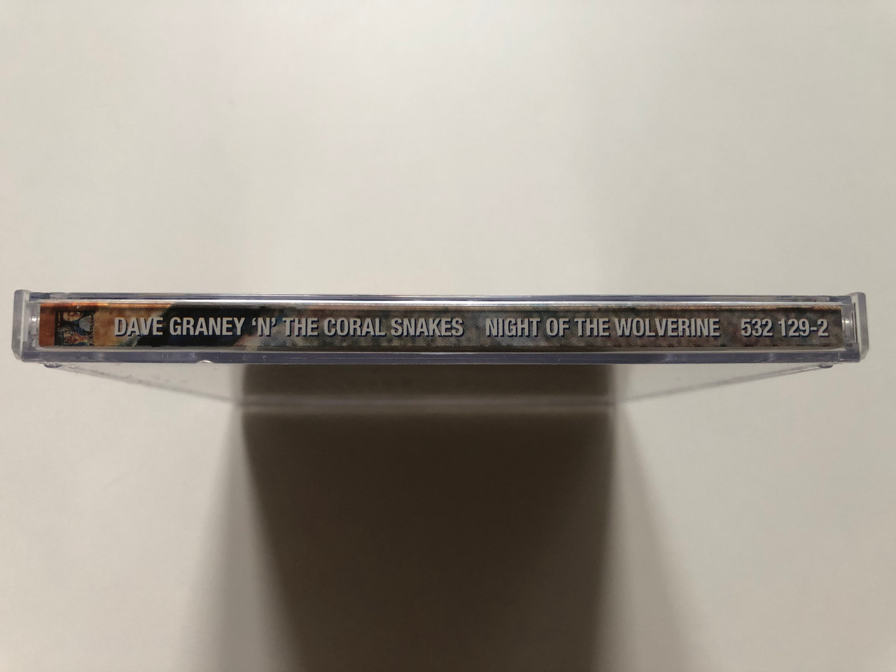 https://cdn11.bigcommerce.com/s-62bdpkt7pb/products/0/images/321981/Dave_Graney_N_The_Coral_Snakes_Night_Of_The_Wolverine_Id_Audio_CD_1996_532_129-2_3__51949.1705653339.1280.1280.JPG?c=2