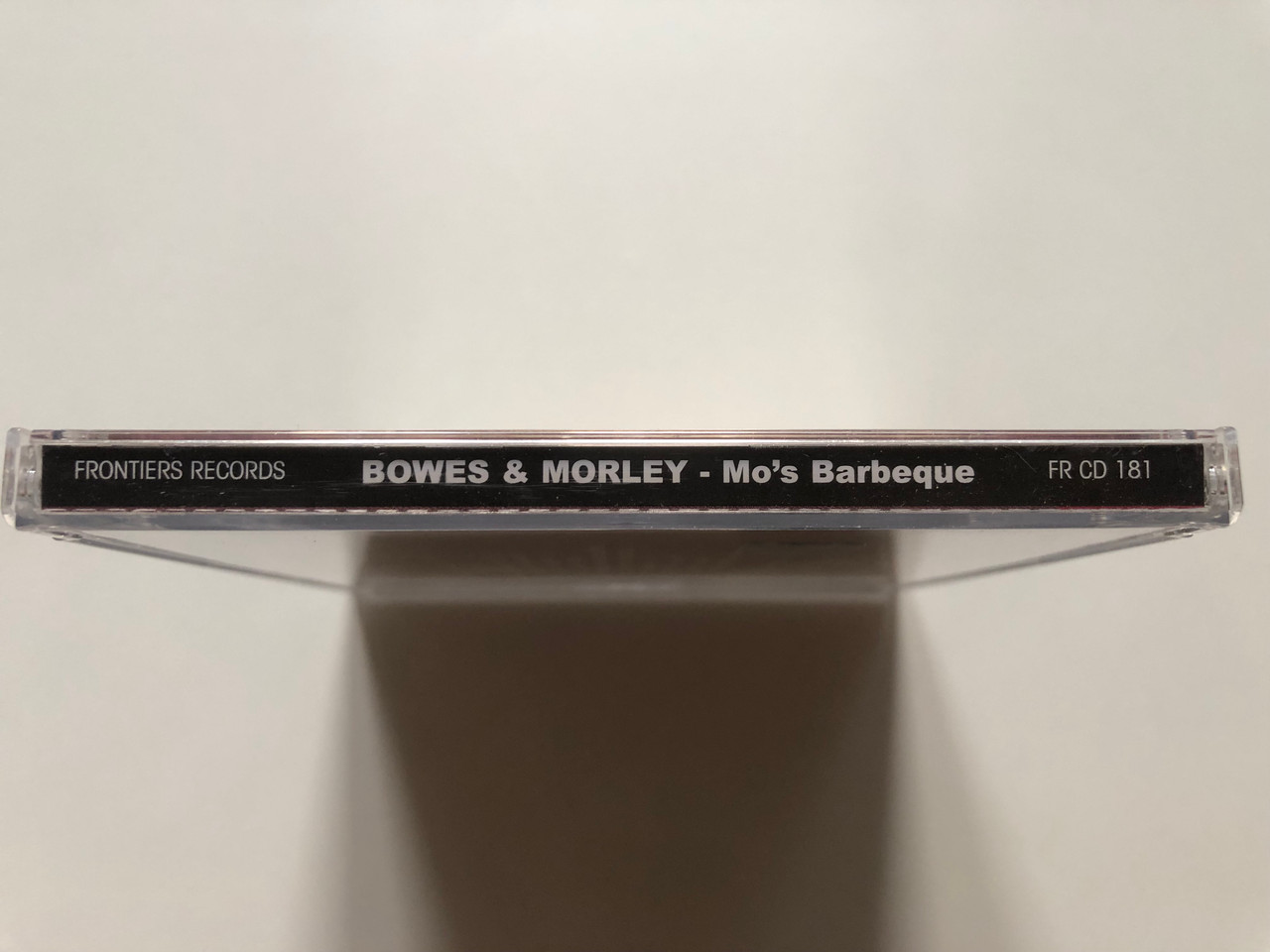 https://cdn11.bigcommerce.com/s-62bdpkt7pb/products/0/images/321999/Bowes_Morley_Mos_Barbeque_Frontiers_Records_Audio_CD_2004_FR_CD_181_3__20975.1705697602.1280.1280.JPG?c=2