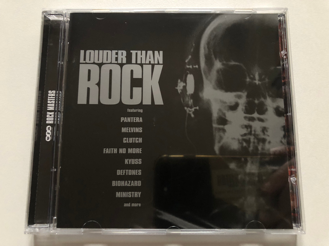 https://cdn11.bigcommerce.com/s-62bdpkt7pb/products/0/images/322121/Louder_Than_Rock_-_Featuring_Pantera_Melvins_Clutch_Faith_No_More_Kyuss_Deftones_Biohazard_Ministry_and_more_Warner_Strategic_Marketing_Australia_Audio_CD_2002_09274_1696-2_1__48270.1705915409.1280.1280.JPG?c=2