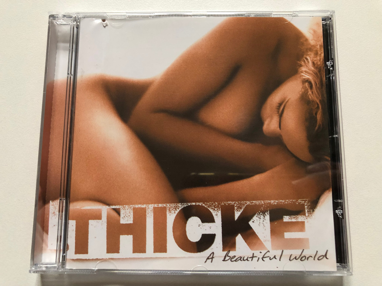 https://cdn11.bigcommerce.com/s-62bdpkt7pb/products/0/images/322132/Thicke_A_Beautiful_World_Nu_America_Audio_CD_2003_493_375-2_1__81050.1705918109.1280.1280.JPG?c=2