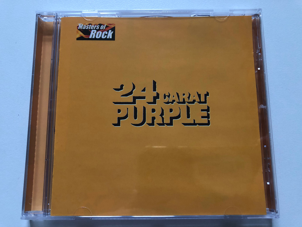https://cdn11.bigcommerce.com/s-62bdpkt7pb/products/0/images/322199/Deep_Purple_24_Carat_Purple_Masters_Of_Rock_EMI_Audio_CD_2001_724353469221_1__16083.1706004039.1280.1280.JPG?c=2