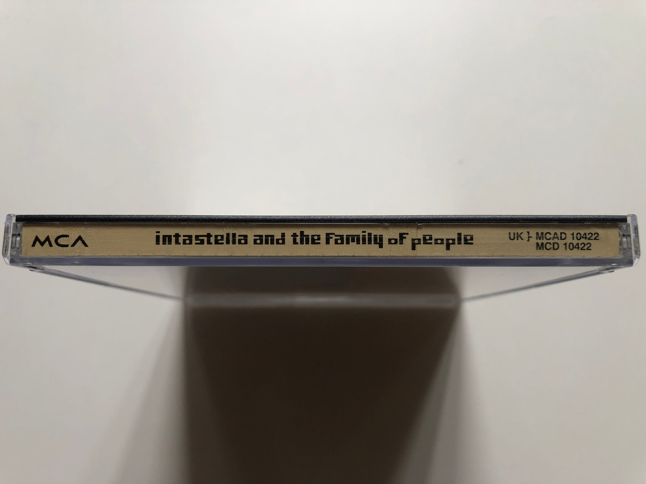 https://cdn11.bigcommerce.com/s-62bdpkt7pb/products/0/images/322365/Intastella_And_The_Family_Of_People_MCA_Records_Audio_CD_1991_MCAD_10422_3__56353.1706167296.1280.1280.JPG?c=2