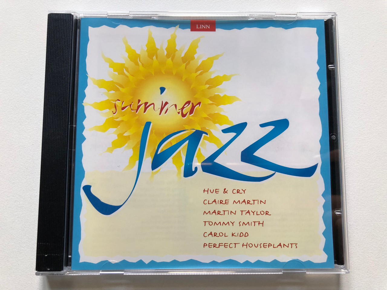 https://cdn11.bigcommerce.com/s-62bdpkt7pb/products/0/images/322402/Summer_Jazz_-_Hue_Cry_Claire_Martin_Martin_Taylor_Tommy_Smith_Carol_Kidd_Perfect_Houseplants_Linn_Records_Audio_CD_1997_AKD_072_1__96049.1706176743.1280.1280.JPG?c=2