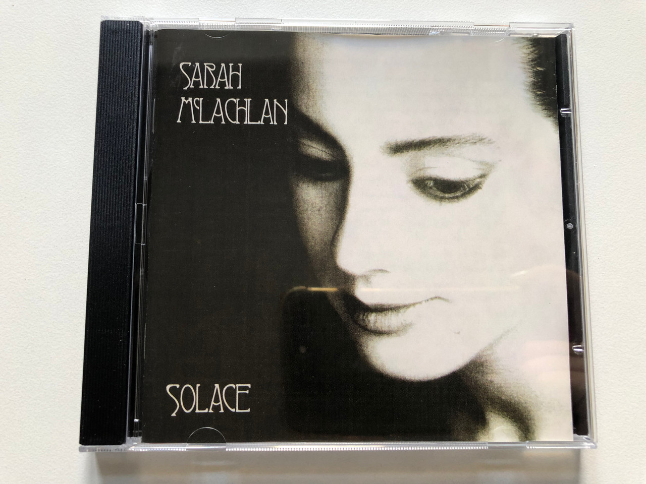 https://cdn11.bigcommerce.com/s-62bdpkt7pb/products/0/images/322473/Sarah_McLachlan_Solace_Arista_Audio_CD_1991_261_955_1__52163.1706261178.1280.1280.JPG?c=2