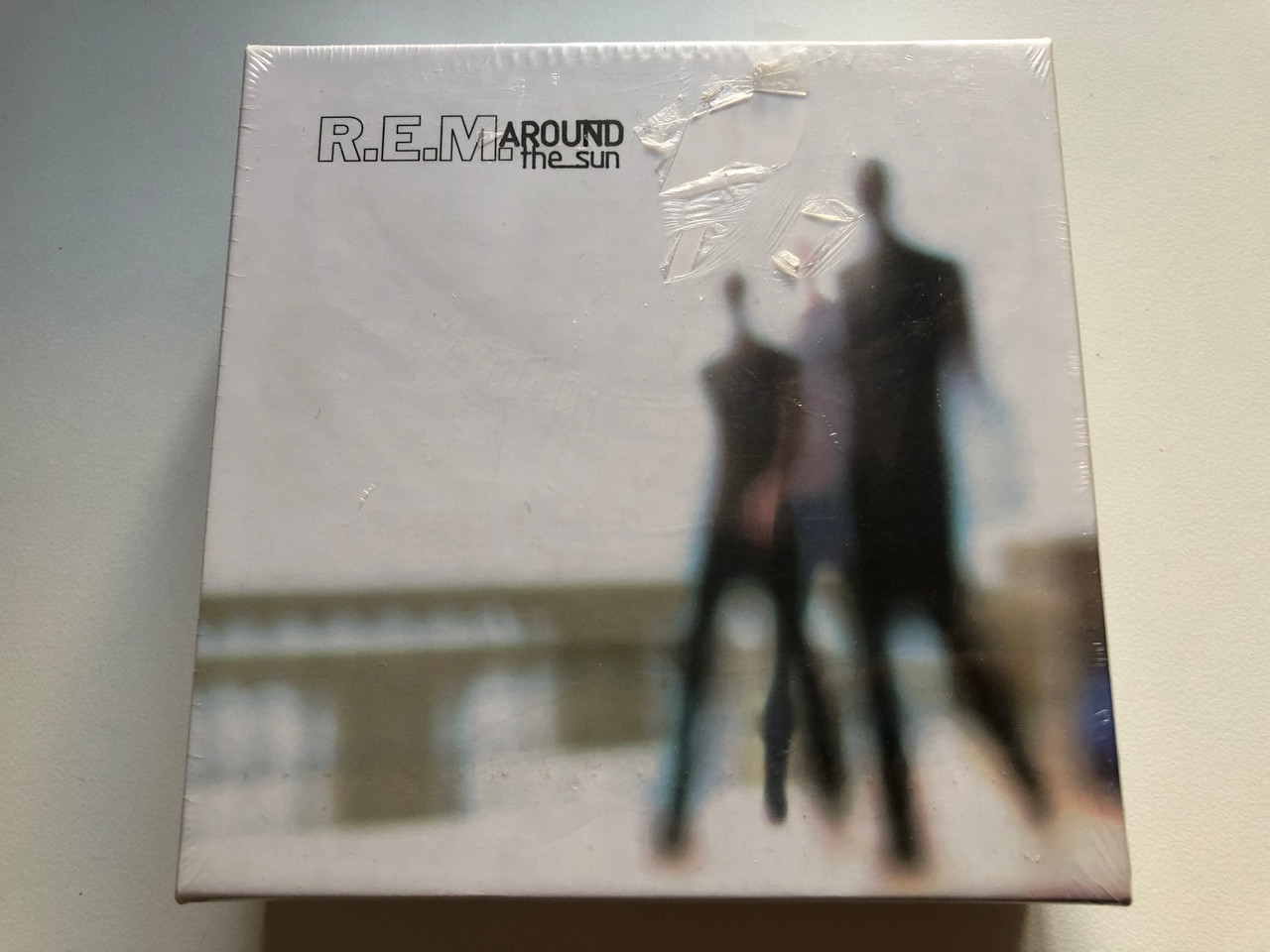 https://cdn11.bigcommerce.com/s-62bdpkt7pb/products/0/images/322892/R.E.M._Around_The_Sun_Warner_Bros._Records_Audio_CD_2004_48906-2_1__41675.1706693895.1280.1280.JPG?c=2