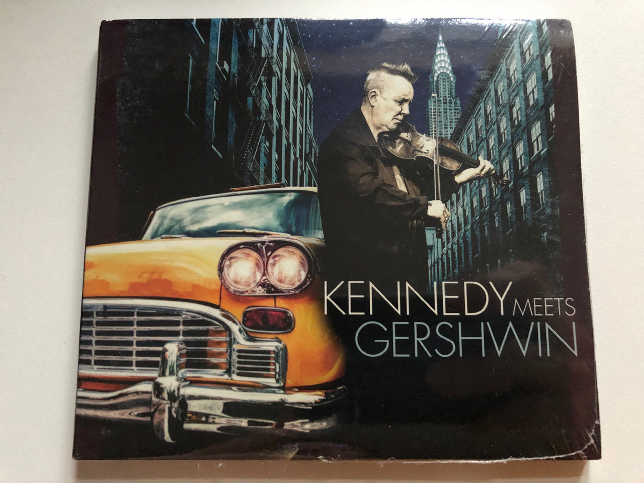 https://cdn11.bigcommerce.com/s-62bdpkt7pb/products/0/images/323221/Kennedy_Meets_Gershwin_Warner_Classics_Audio_CD_2018_0190295642136_1__03979.1706853610.1280.1280.JPG?c=2