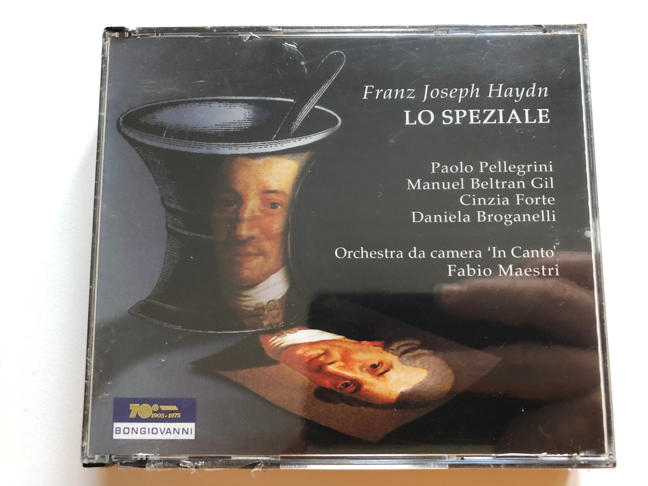 https://cdn11.bigcommerce.com/s-62bdpkt7pb/products/0/images/323232/Franz_Joseph_Haydn_Lo_Speziale_-_Paolo_Pellegrini_Manuel_Beltran_Gil_Cinzia_Forte_Daniele_Broganelli_Orchestra_Da_Camera_In_Canto_Fabio_Maestri_Bongiovanni_2x_Audio_CD_1994_GB_21712-_1__17925.1706856384.1280.1280.JPG?c=2