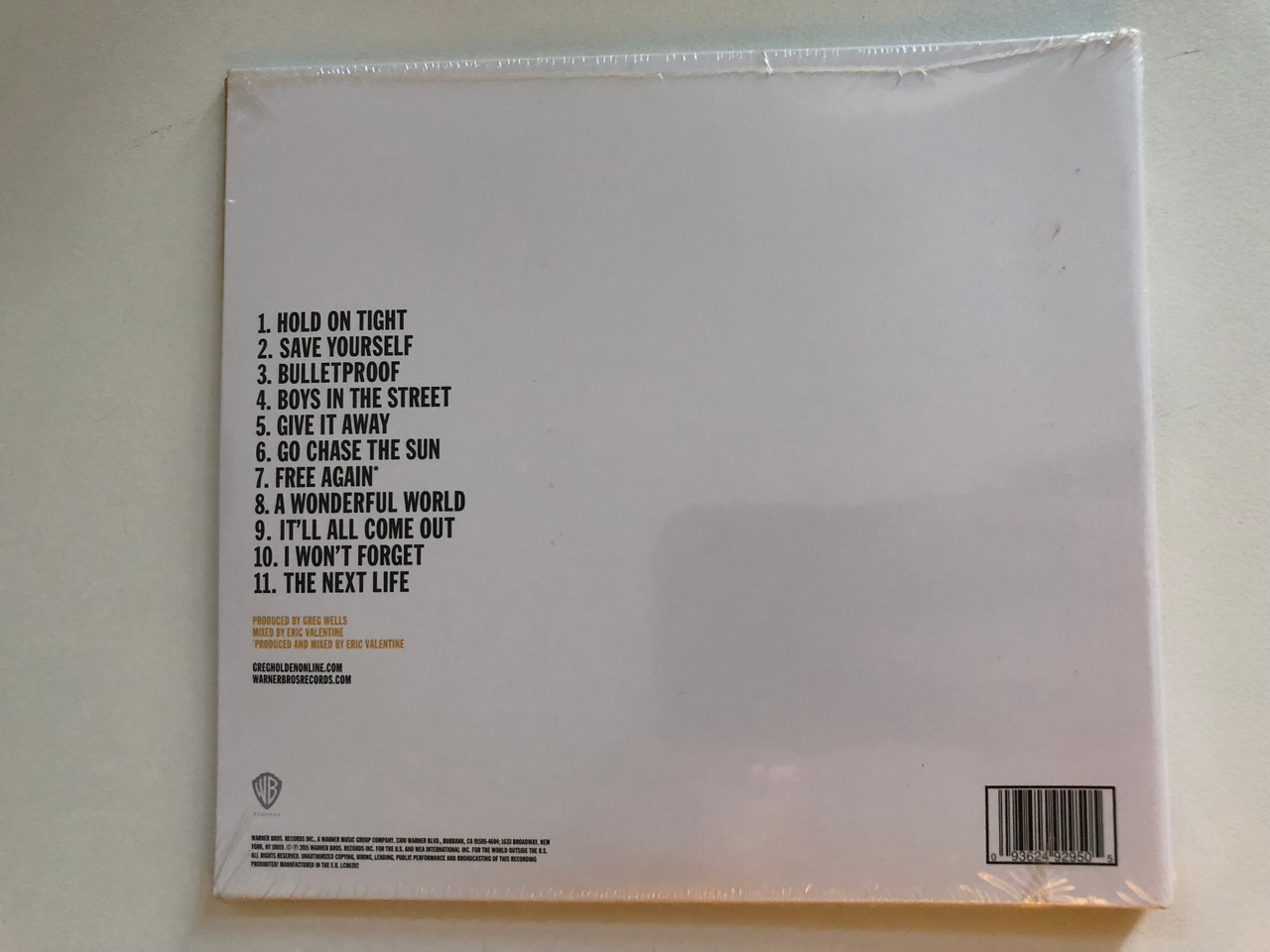 https://cdn11.bigcommerce.com/s-62bdpkt7pb/products/0/images/323531/Greg_Holden_Chase_The_Sun_Featuring_Hold_On_Tight_Boys_In_the_Street_WEA_Audio_CD_2015_9362-49295-0_2__31924.1707121814.1280.1280.JPG?c=2