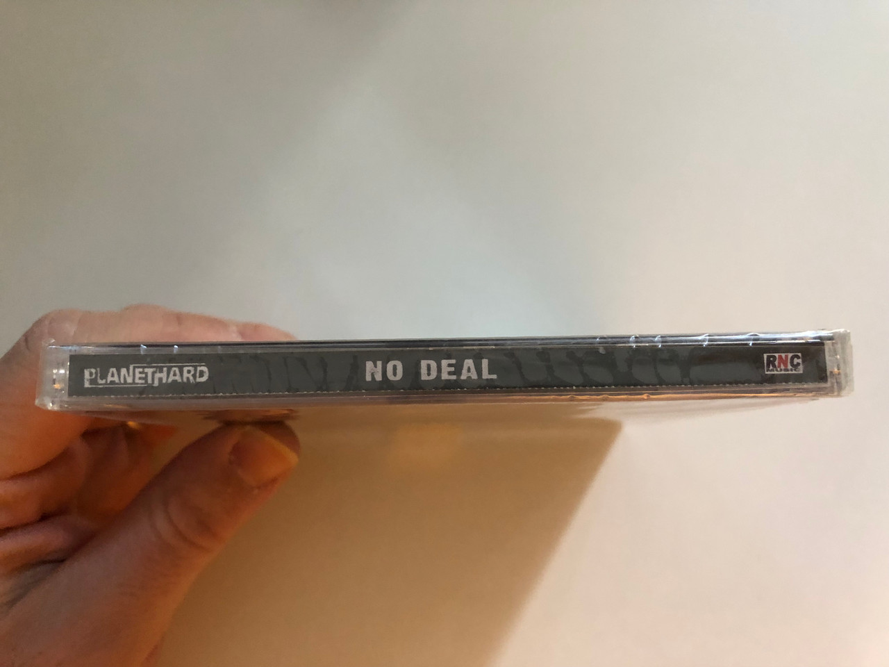 https://cdn11.bigcommerce.com/s-62bdpkt7pb/products/0/images/323571/Planethard_No_Deal_RNC_Music_Audio_CD_2012_OBR006_3__66380.1707128582.1280.1280.JPG?c=2